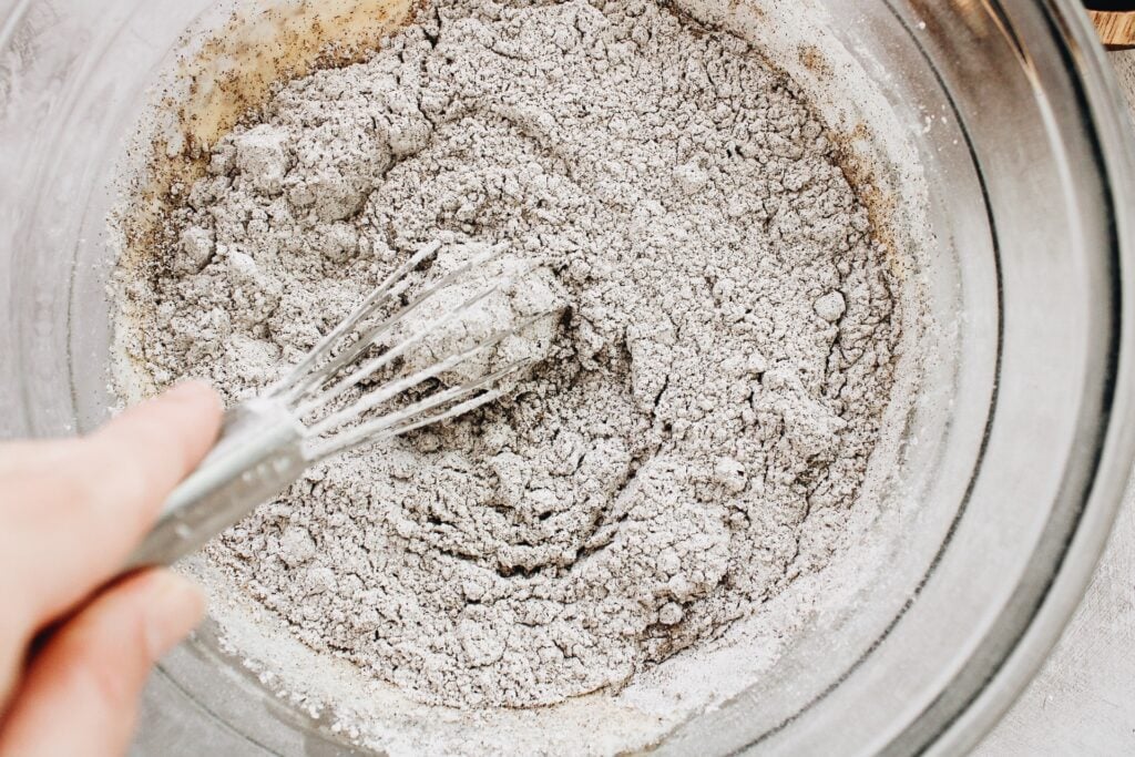 dry and wet ingredients being whisked