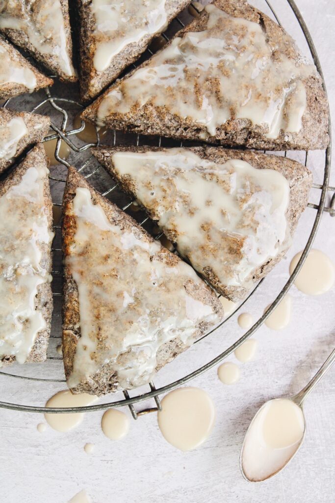 buckwheat scones with maple glaze on an antique circular cooling rack