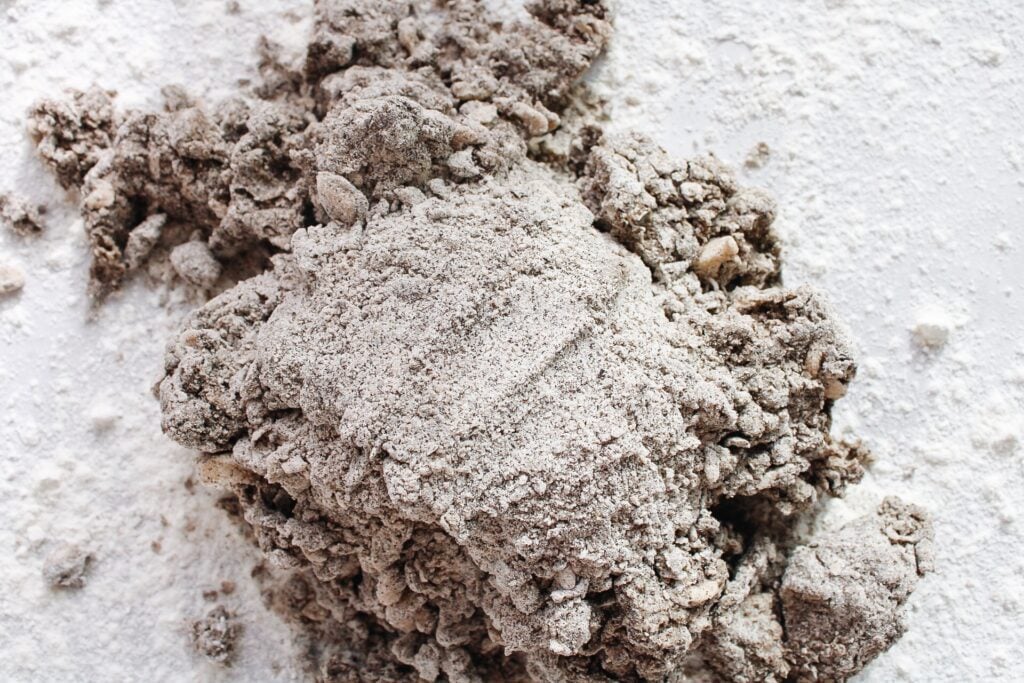 scone dough mound with dry flour mixture on top