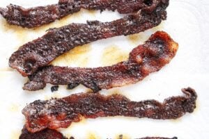 chipotle bacon on a paper towel lined baking sheet