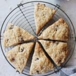 date scones on an antique baking rack with a blue napkin to the side