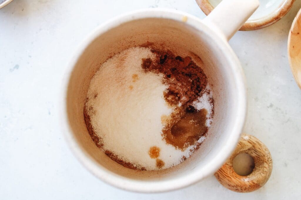 sugar, cocoa powder, salt and vanilla in a mug
