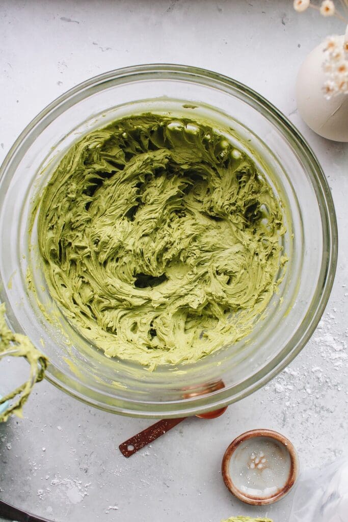 matcha frosting in a mixing bowl