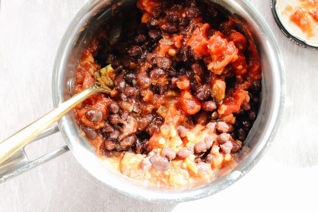 salsa and black beans in a small pot