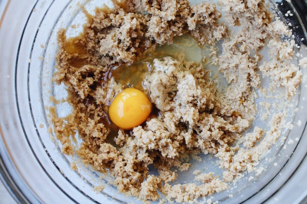 creamed butter and brown sugar with an egg