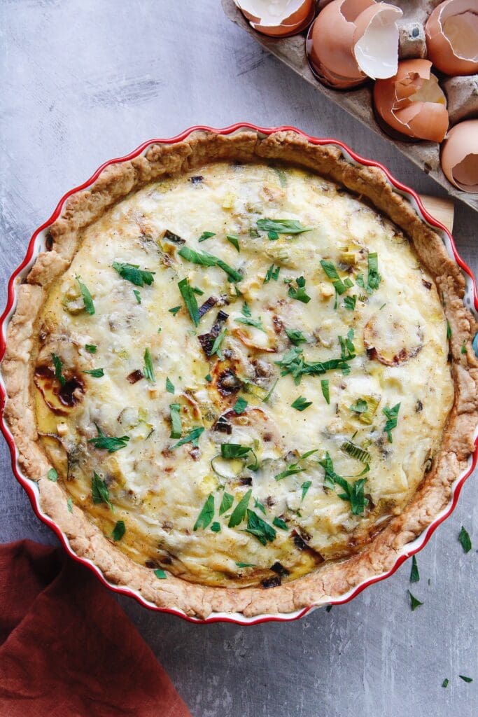 potato and leek quiche just out of the oven before slicing