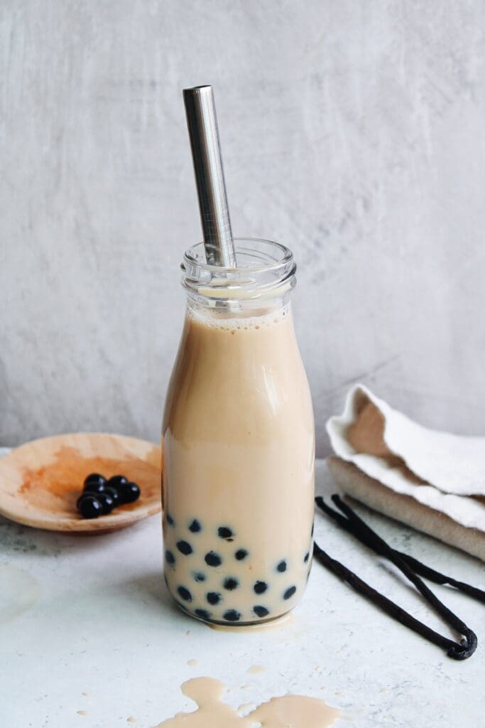 vanilla milk tea in a small glass bottle