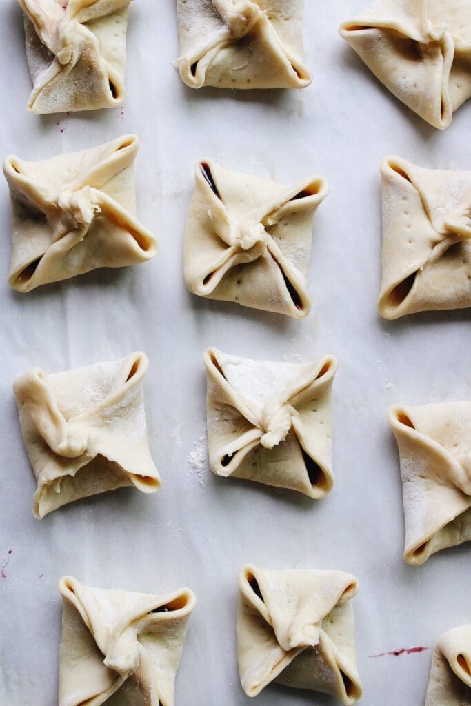 prepped jam puff pastry tarts without egg wash and raw sugar