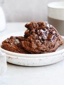 whole wheat chocolate chocolate chip cookies on a white plate