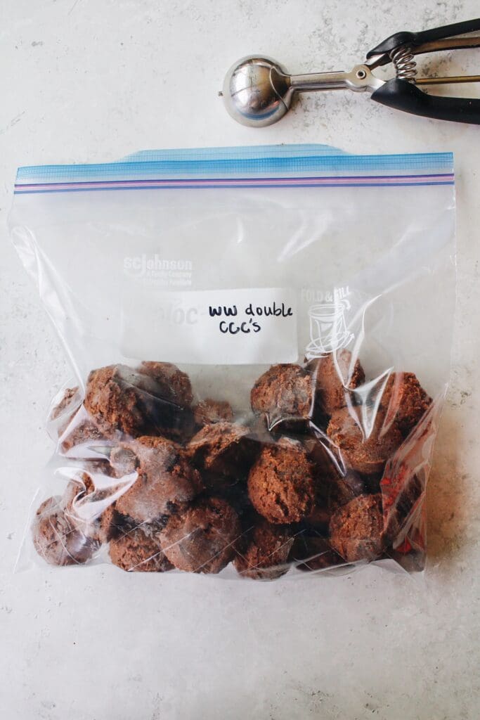 frozen whole wheat chocolate chocolate chip cookie dough balls in a Ziploc bag