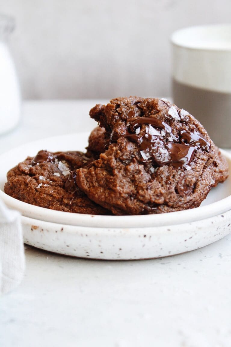 whole wheat chocolate chocolate chip cookies on a white plate
