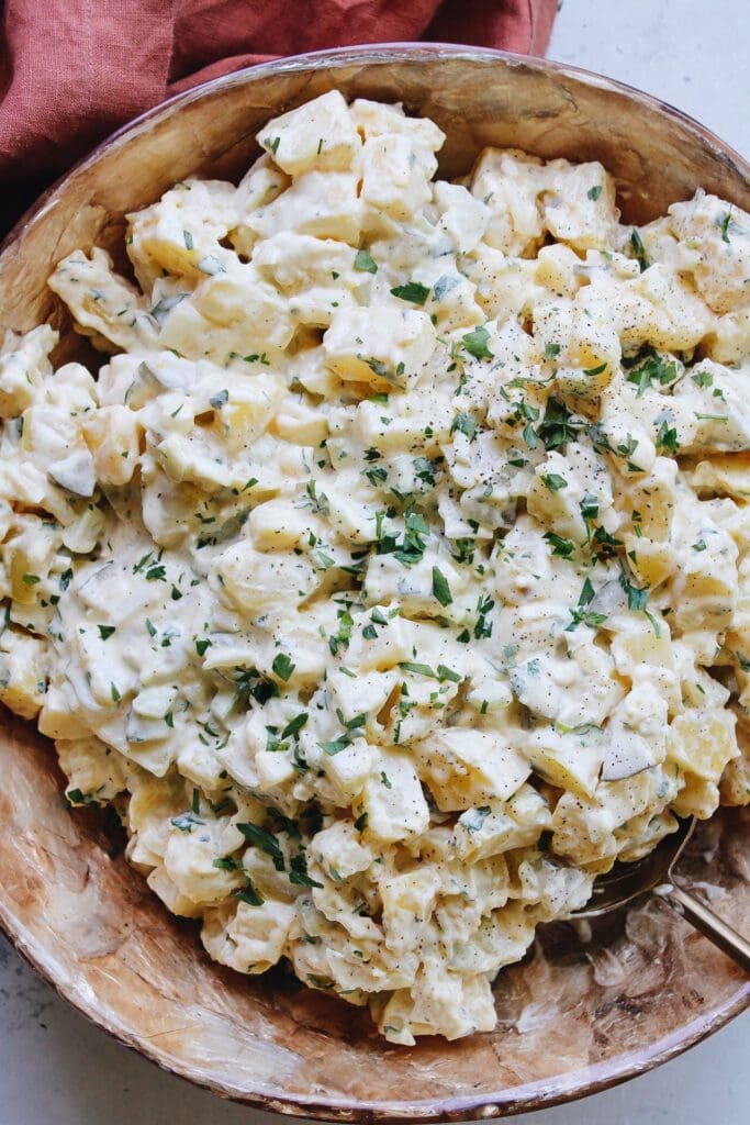 potato salad with pickles in a large bowl