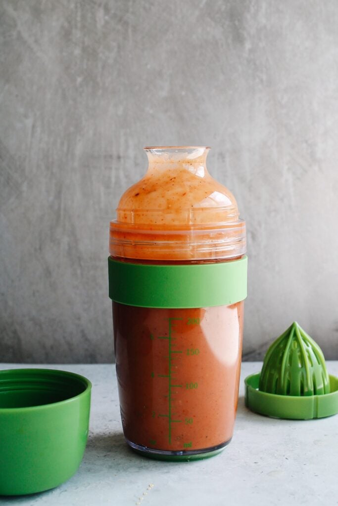 salad dressing share filled with spicy salad dressing