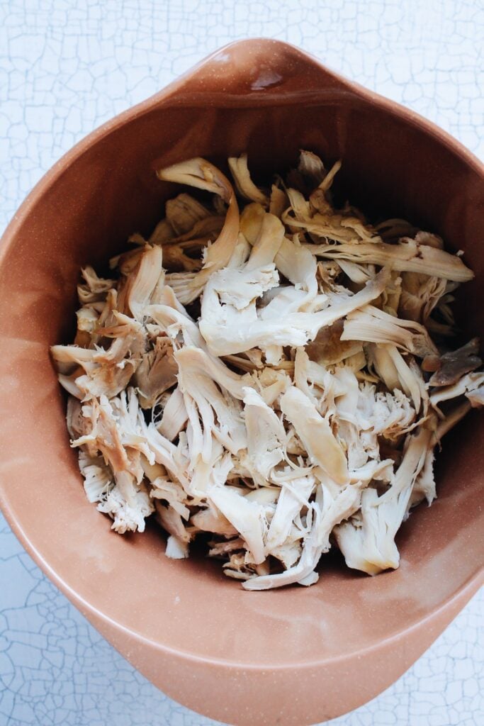 shredded rotisserie chicken in a bowl