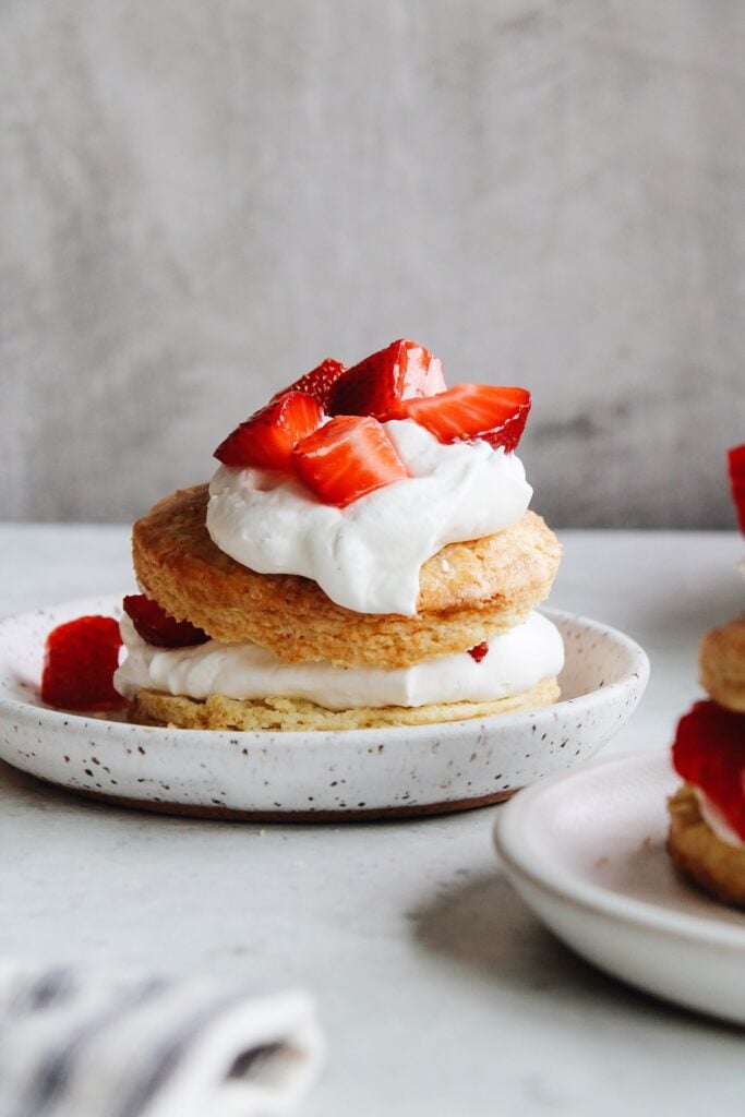 biscuit strawberry shortcake on a white dessert plate