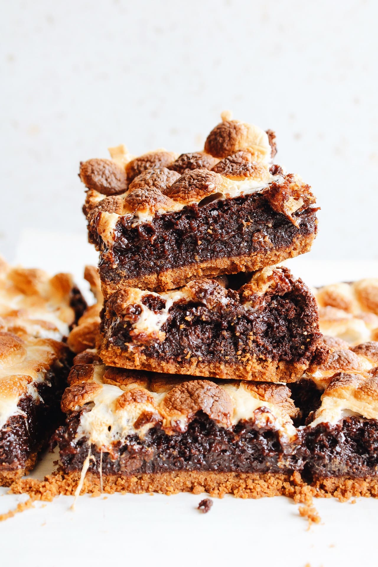 smores brownies stacked on top of eachother looking mighty fine