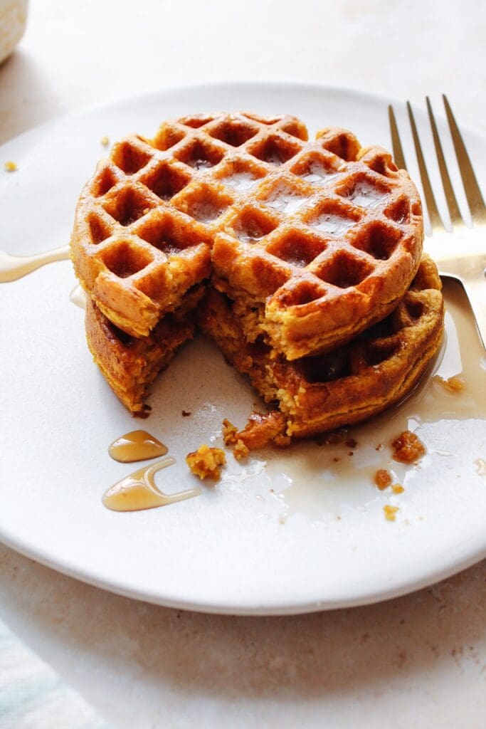 pumpkin spice waffles on a white plate