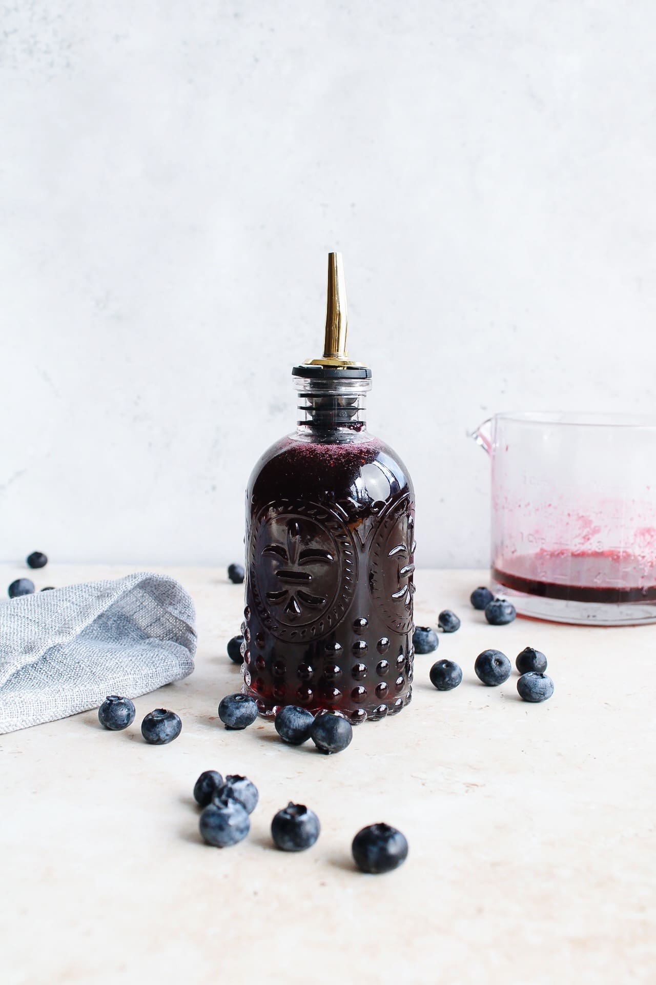 blueberry syrup in a glass bottle